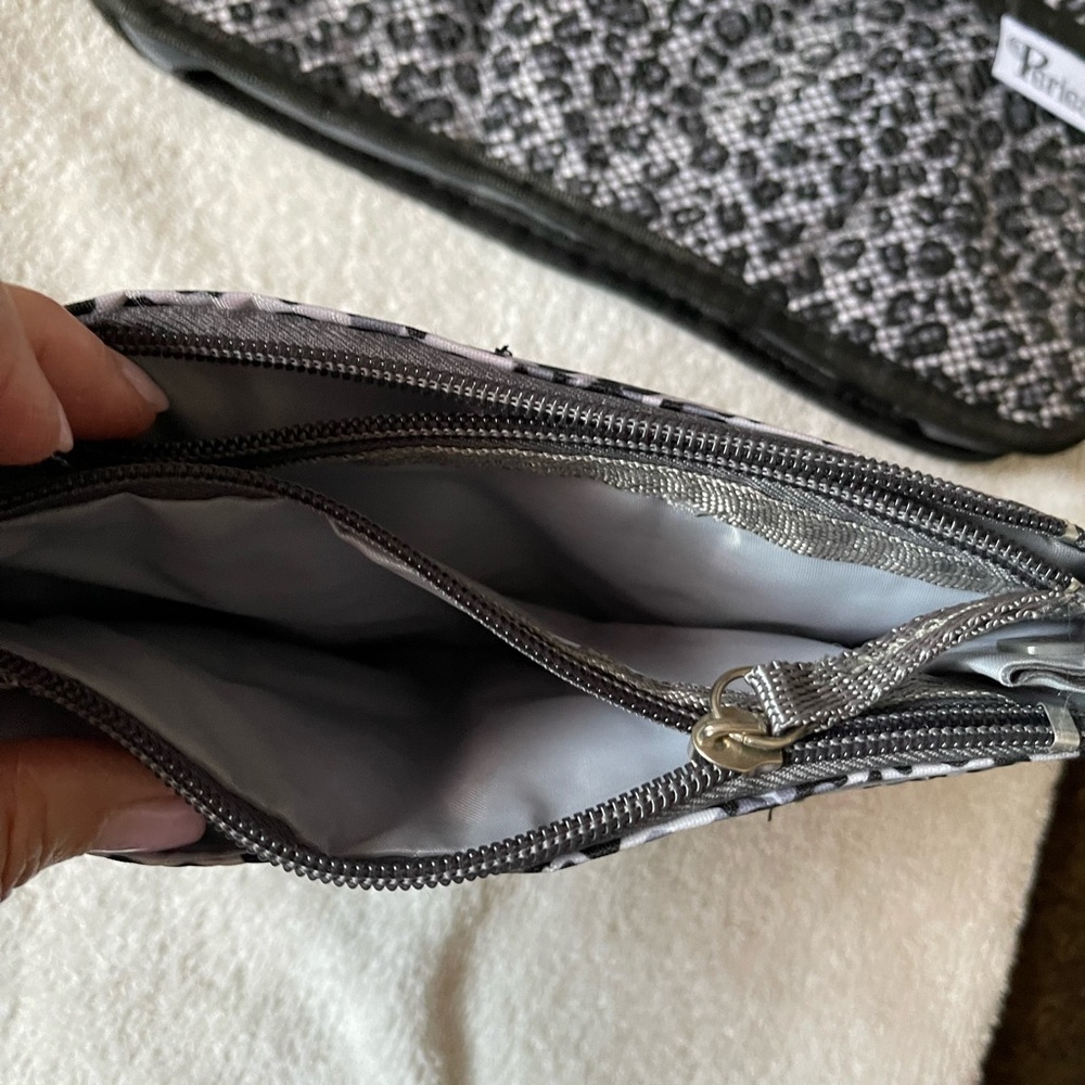 Purse organizers. Small and medium. Lots of pockets. Brand new. No tags.